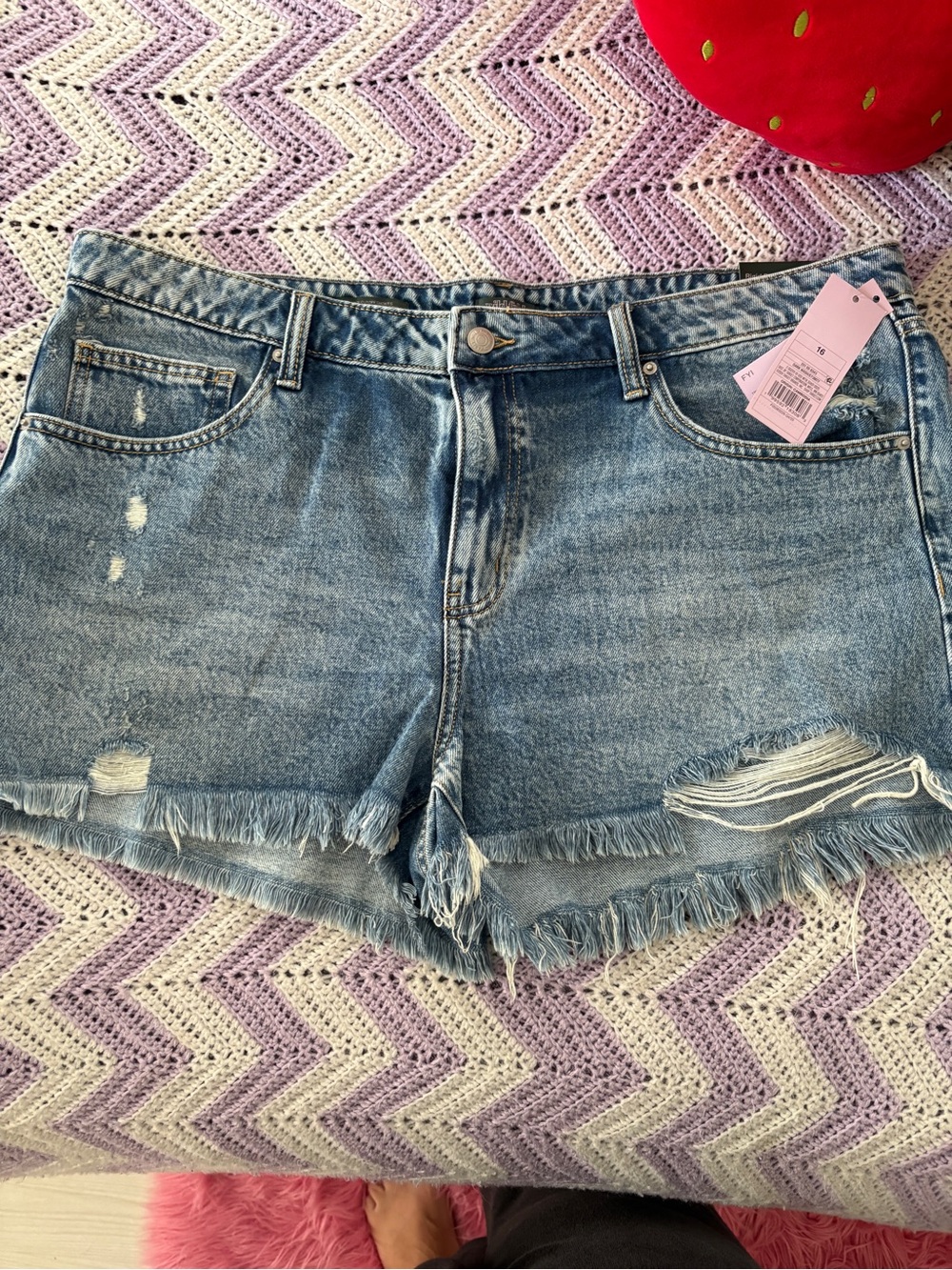 High-Rise Light Blue Distressed Denim Shorts